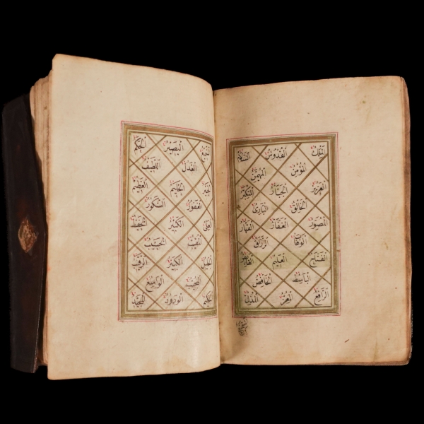 ENAM-I ŞERİF (Sureler, esma-i hüsna, esma-i nebi, hilye-i nebi, dualar), ketebe: Hasan Vehbi Efendi talebesi Seyyid Ahmed Nazifi, 1225, serlevhalı, tüm sayfaları tahrirli altın cetvelli, sure başları altın levhalı, ketebe sayfası tezyinatlı, şemseli köşebentli deri dönem cildinde, 172 sayfa, 14x9 cm...